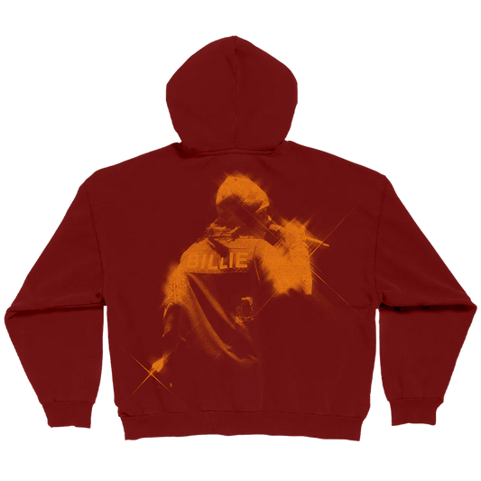 Back view of Billie Eilish Encore red zip-up hoodie featuring a vivid orange concert photo-style print of Billie performing live, with “BILLIE” text across the shoulders. Bold and energetic Billie Eilish merch celebrating her stage presence.

