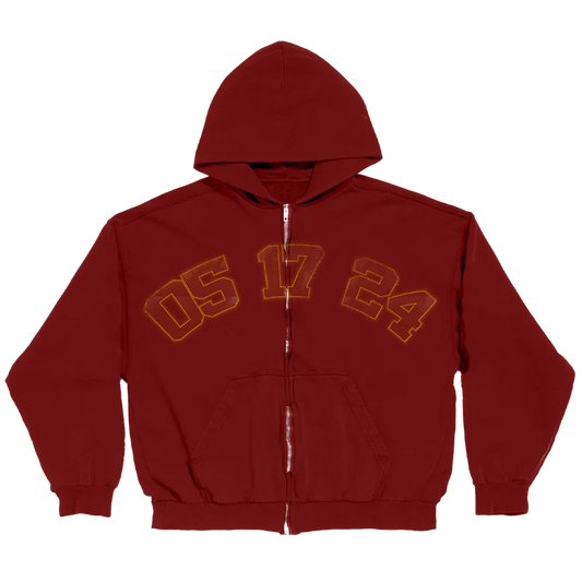 Front of the Billie Eilish Encore red zip hoodie with arched yellow-orange numbers “05 17 24” across the chest, referencing the album release date. Soft, heavyweight zip-up hoodie with bold lettering and official merch status.

